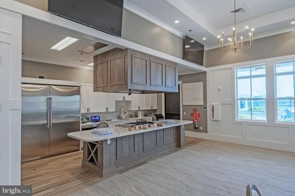 Chandelier, Interior, Kitchen, Pendant Lights, Recessed Lighting, Stainless Steel Appliances, Wood Texture Flooring