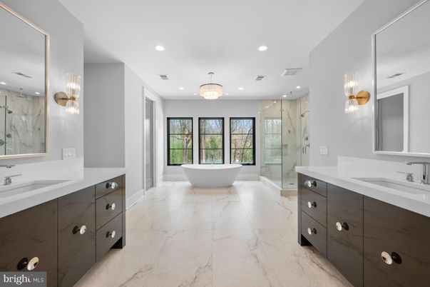 Bathroom, Dual Sink Vanities, Free Standing Baths, Glass Shower, Interior, Marble, Marble Walls, Pendant Lights, Recessed Lighting