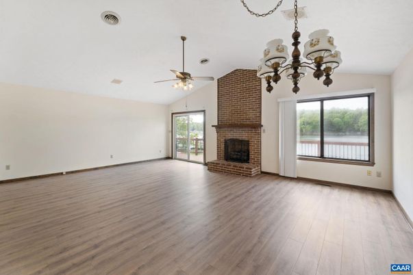Chandelier, Empty room, Fireplace, Interior, Stone Walls, Wood Texture Flooring