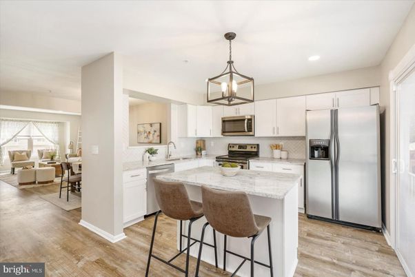 Dining room, Interior, Kitchen, Living room, Pendant Lights, Recessed Lighting, Stainless Steel Appliances, Wood Texture Flooring