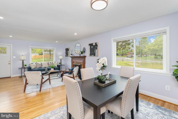 Dining room, Fireplace, Interior, Living room, Recessed Lighting, Wood Texture Flooring