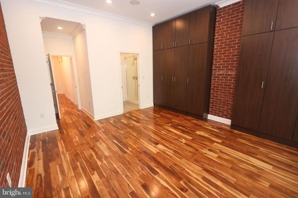 Empty room, Interior, Recessed Lighting, Stone Walls, Wood Texture Flooring