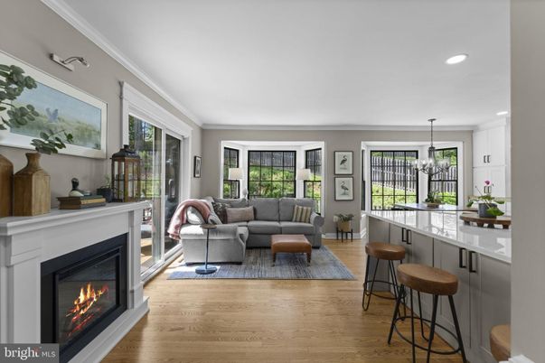 Chandelier, Fireplace, Interior, Living room, Pendant Lights, Recessed Lighting, Wood Texture Flooring