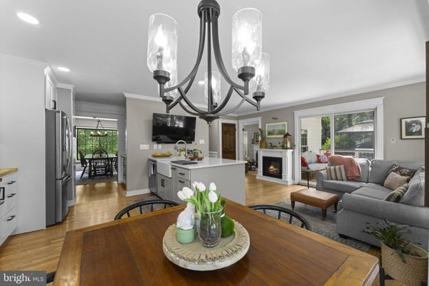 Chandelier, Dining room, Fireplace, Interior, Kitchen, Living room, Recessed Lighting, Wood Texture Flooring