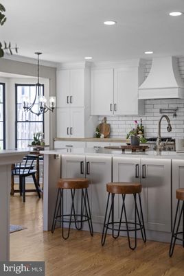 Chandelier, Dining room, Interior, Kitchen, Recessed Lighting, Stainless Steel Appliances, Wood Texture Flooring