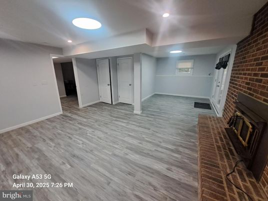 Empty room, Interior, Recessed Lighting, Stone Walls, Wood Texture Flooring