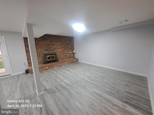 Empty room, Fireplace, Interior, Stone Walls, Wood Texture Flooring