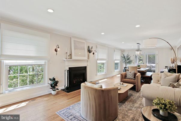 Dining room, Fireplace, Interior, Living room, Pendant Lights, Recessed Lighting, Wood Texture Flooring