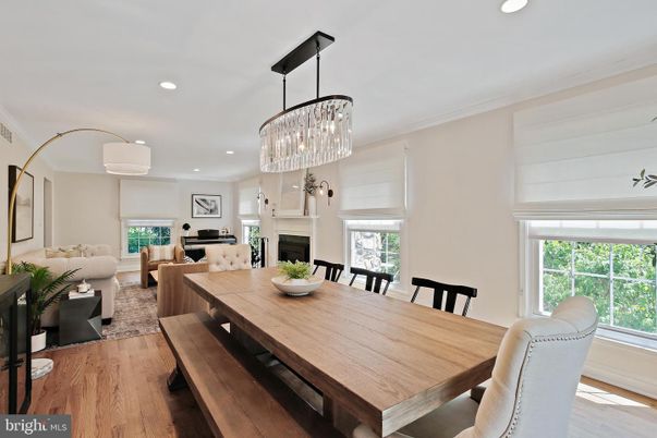 Chandelier, Dining room, Fireplace, Interior, Living room, Piano, Recessed Lighting, Wood Texture Flooring