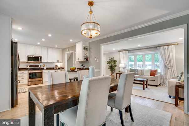 Chandelier, Dining room, Interior, Kitchen, Living room, Recessed Lighting, Stainless Steel Appliances, Wood Texture Flooring