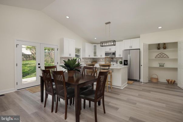 Dining room, Interior, Kitchen, Pendant Lights, Recessed Lighting, Stainless Steel Appliances, Wood Texture Flooring
