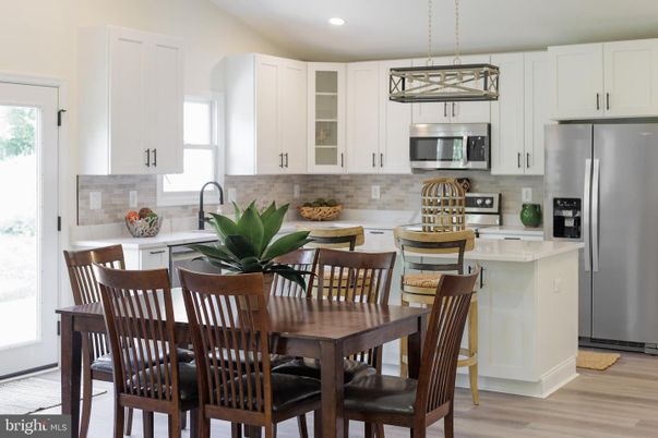 Dining room, Interior, Kitchen, Pendant Lights, Recessed Lighting, Stainless Steel Appliances, Wood Texture Flooring