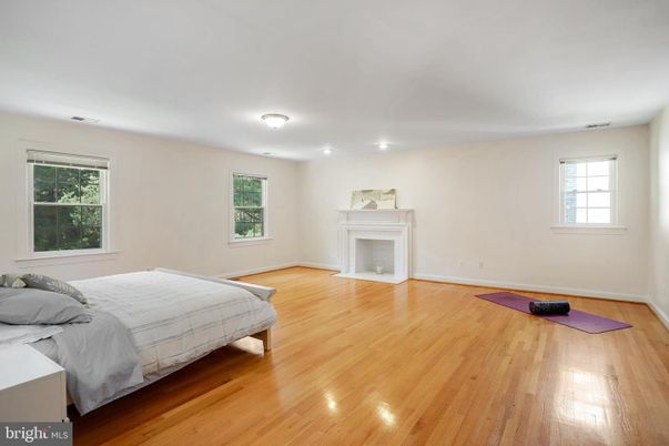 Bedroom, Fireplace, Interior, Recessed Lighting, Wood Texture Flooring