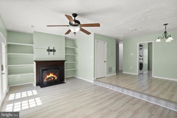 Empty room, Fireplace, Interior, Pendant Lights, Wood Texture Flooring