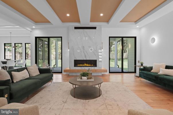 Dining room, Fireplace, Interior, Living room, Marble Walls, Pendant Lights, Recessed Lighting, Wood Texture Flooring
