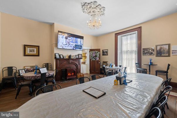 Chandelier, Dining room, Fireplace, Interior, Wood Texture Flooring