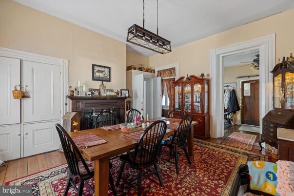 Dining room, Fireplace, Interior, Pendant Lights, Wood Texture Flooring
