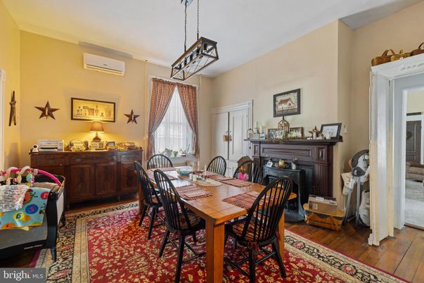 Dining room, Fireplace, Interior, Pendant Lights, Wood Texture Flooring