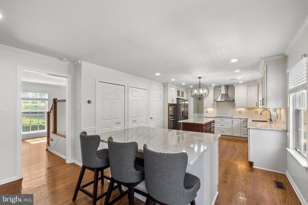 Chandelier, Interior, Kitchen, Recessed Lighting, Stainless Steel Appliances, Wood Texture Flooring