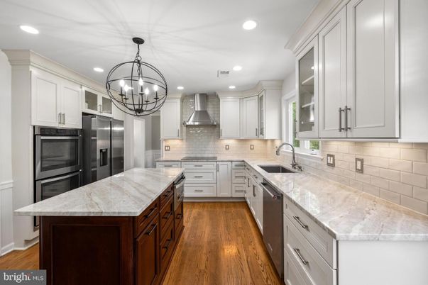Chandelier, Interior, Kitchen, Recessed Lighting, Stainless Steel Appliances, Wood Texture Flooring