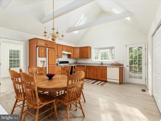 Chandelier, Dining room, Interior, Kitchen, Stainless Steel Appliances, Wood Texture Flooring
