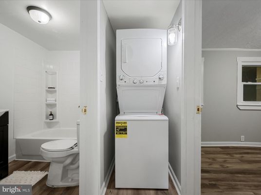 Bathroom, Interior, Utility Closets, Washer, Wood Texture Flooring
