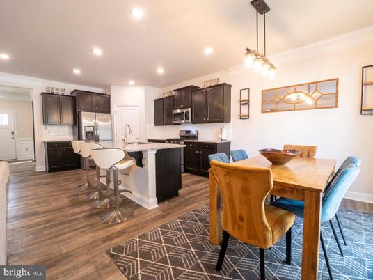 Dining room, Interior, Kitchen, Pendant Lights, Recessed Lighting, Stainless Steel Appliances, Wood Texture Flooring