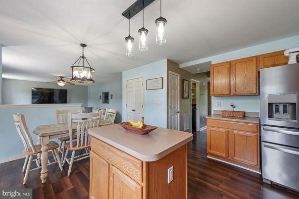 Dining room, Interior, Kitchen, Pendant Lights, Stainless Steel Appliances, Wood Texture Flooring