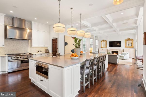Fireplace, Interior, Kitchen, Living room, Pendant Lights, Recessed Lighting, Stainless Steel Appliances, Wood Texture Flooring