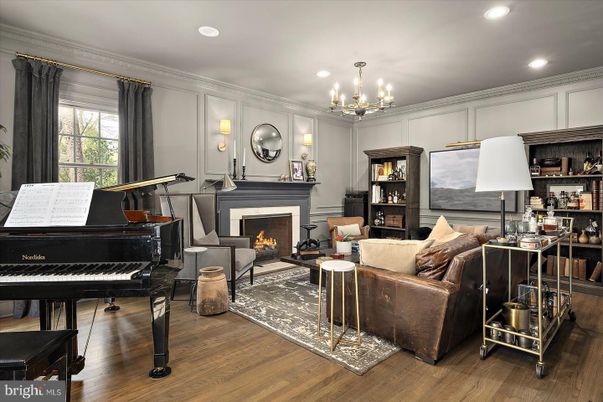 Chandelier, Fireplace, Interior, Living room, Piano, Recessed Lighting, Wood Texture Flooring