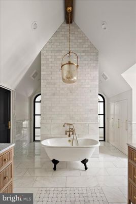 Bathroom, Free Standing Baths, Interior, Marble, Pendant Lights, Recessed Lighting, Stone Walls, Wooden Beams