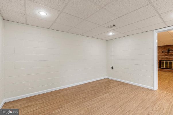 Empty room, Interior, Recessed Lighting, Stone Walls, Wood Texture Flooring