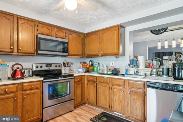 Interior, Kitchen, Pendant Lights, Stainless Steel Appliances, Wood Texture Flooring