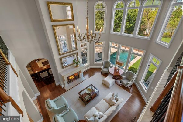 Chandelier, Fireplace, Interior, Living room, Piano, Wood Texture Flooring