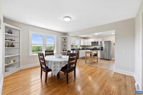 Dining room, Interior, Kitchen, Recessed Lighting, Stainless Steel Appliances, Wood Texture Flooring