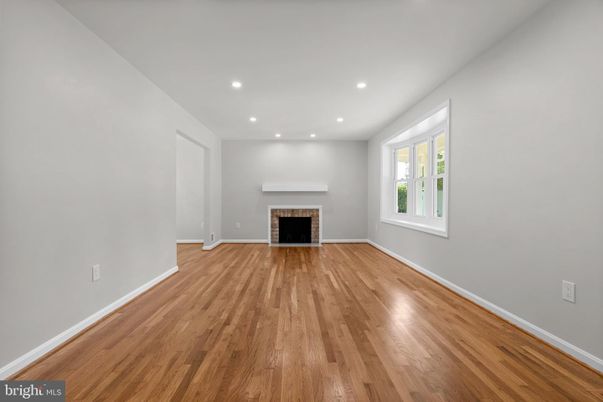 Empty room, Fireplace, Interior, Recessed Lighting, Wood Texture Flooring