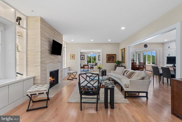 Dining room, Fireplace, Interior, Living room, Recessed Lighting, Wood Texture Flooring