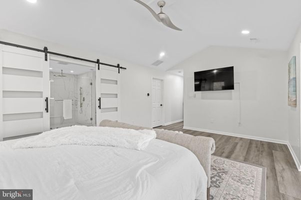 Bathroom, Bedroom, Glass Shower, Interior, Recessed Lighting, Wood Texture Flooring