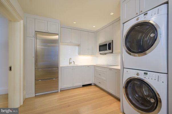 Interior, Kitchen, Recessed Lighting, Utility Closets, Washer, Wood Texture Flooring