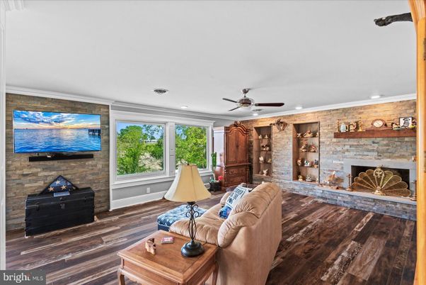 Fireplace, Interior, Recessed Lighting, Stone Walls, Wood Texture Flooring