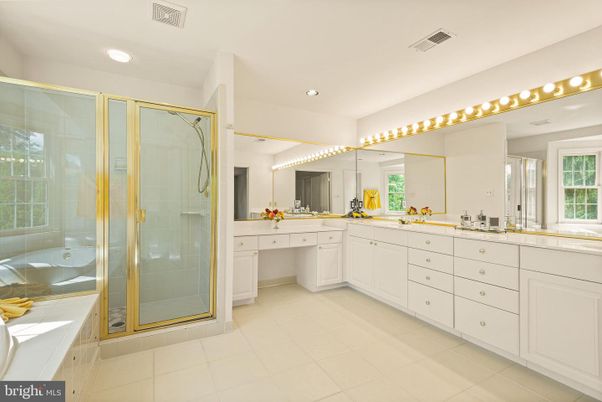 Bathroom, Dual Sink Vanities, Glass Shower, Interior, Recessed Lighting, Tile Countertops