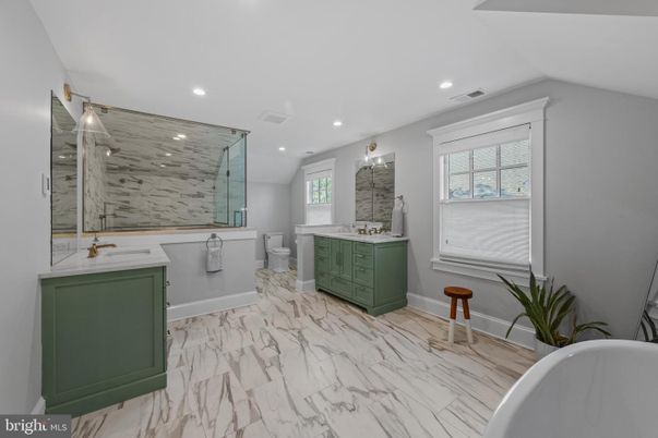 Bathroom, Dual Sink Vanities, Free Standing Baths, Glass Shower, Interior, Marble, Marble Walls, Recessed Lighting