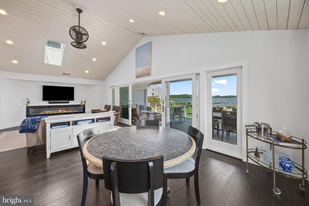 Dining room, Interior, Living room, Pendant Lights, Recessed Lighting, Water, Wood Texture Flooring