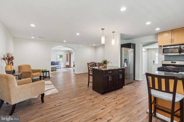 Dining room, Interior, Kitchen, Living room, Pendant Lights, Recessed Lighting, Stainless Steel Appliances, Wood Texture Flooring