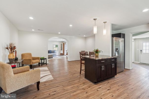 Dining room, Interior, Kitchen, Living room, Pendant Lights, Recessed Lighting, Stainless Steel Appliances, Wood Texture Flooring