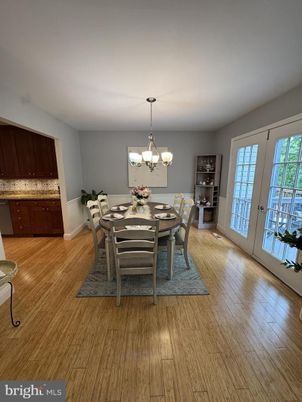 Chandelier, Dining room, Interior, Wood Texture Flooring