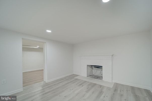 Empty room, Fireplace, Interior, Recessed Lighting, Wood Texture Flooring