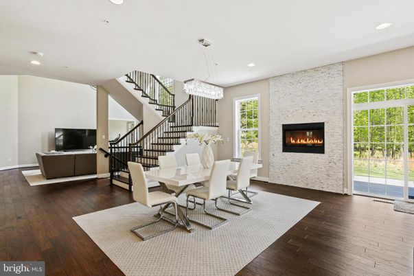 Chandelier, Dining room, Fireplace, Interior, Recessed Lighting, Wood Texture Flooring