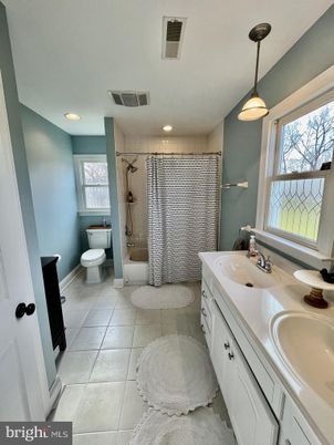 Bathroom, Dual Sink Vanities, Glass Shower, Interior, Pendant Lights, Recessed Lighting