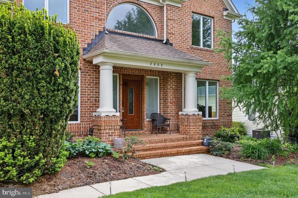 Exterior, Facade, Brick Facade, American Foursquare